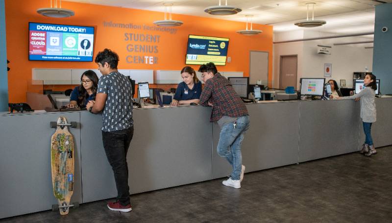 Student Genius Center Desk with students helping students