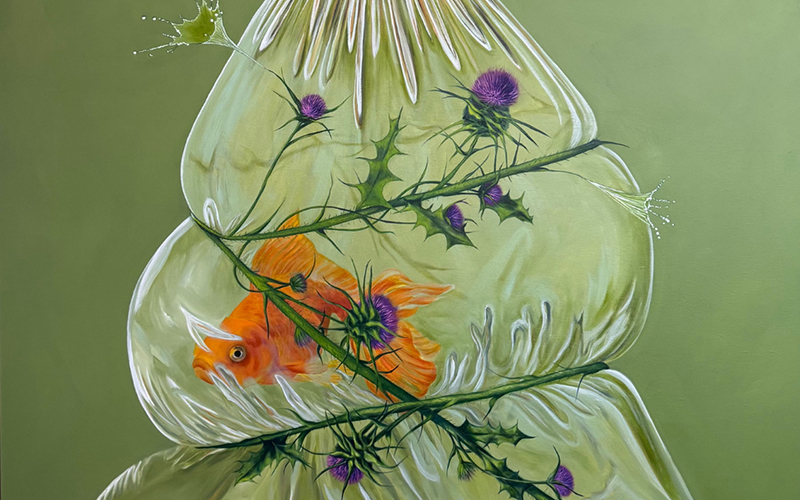 Plastic bag with a goldfish inside wrapped with flowers.