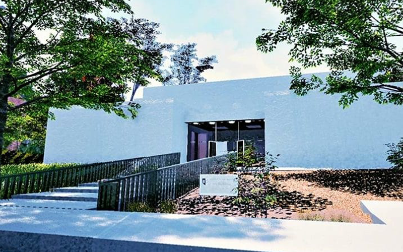 White building with landscaping