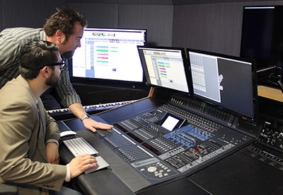 Dave Mickey instructs a technical theatre student