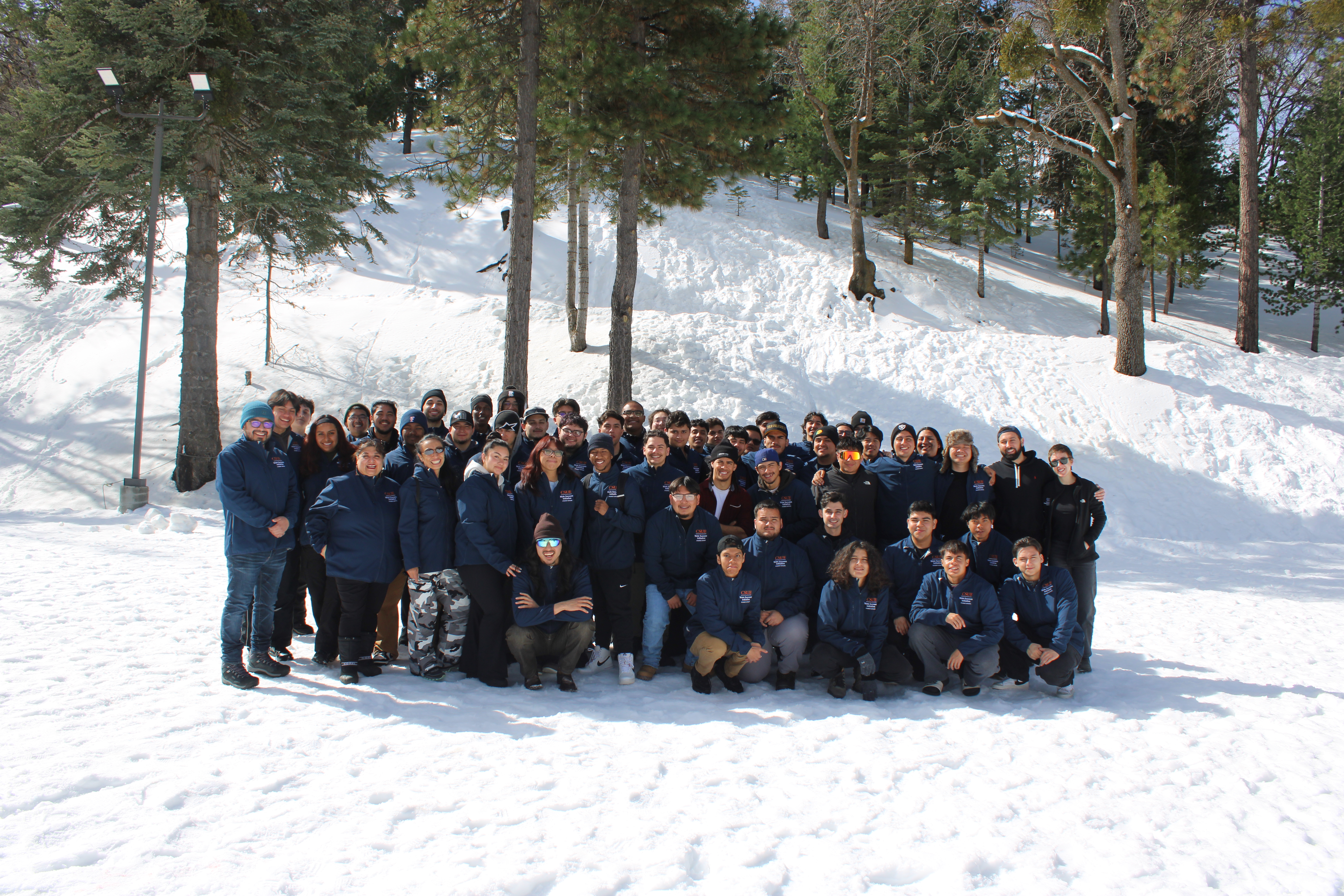MSI Students and staff posing for picture in snow