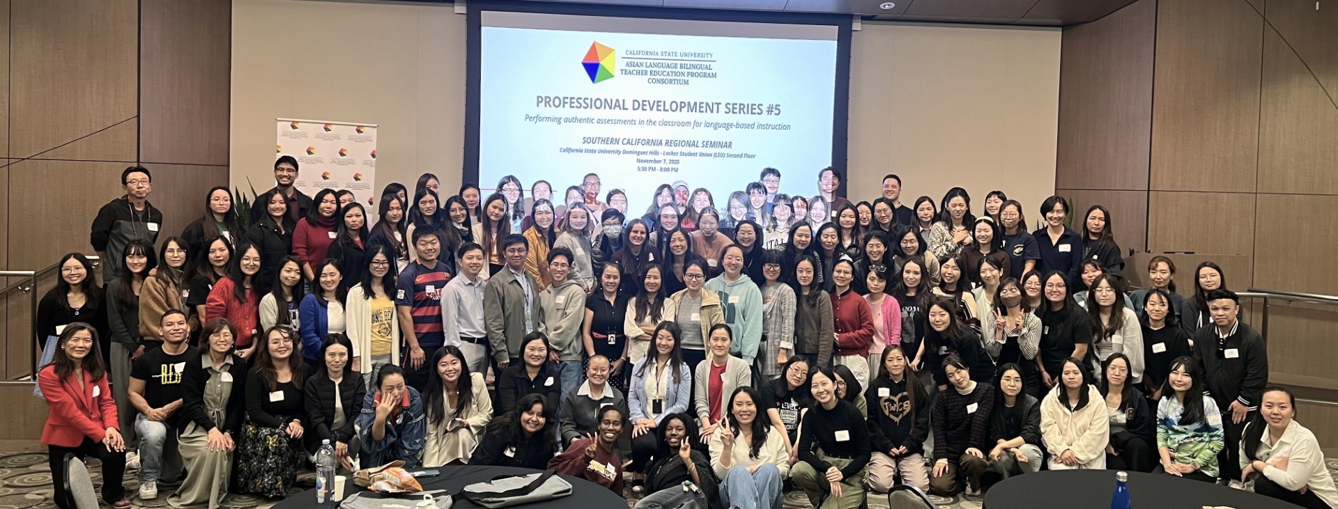 A group of Asian language scholars smile for the camera.