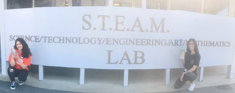 Two CSUF students pose outside of STEAM Lab