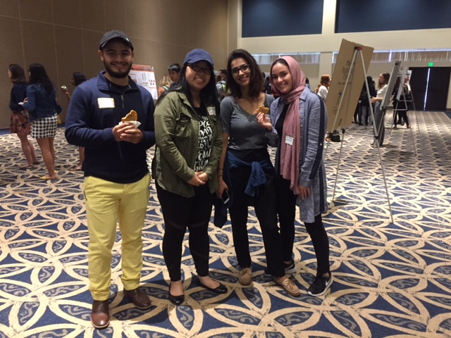 Four SACNAS members pose for photo at SACNAS Poster Practice Session