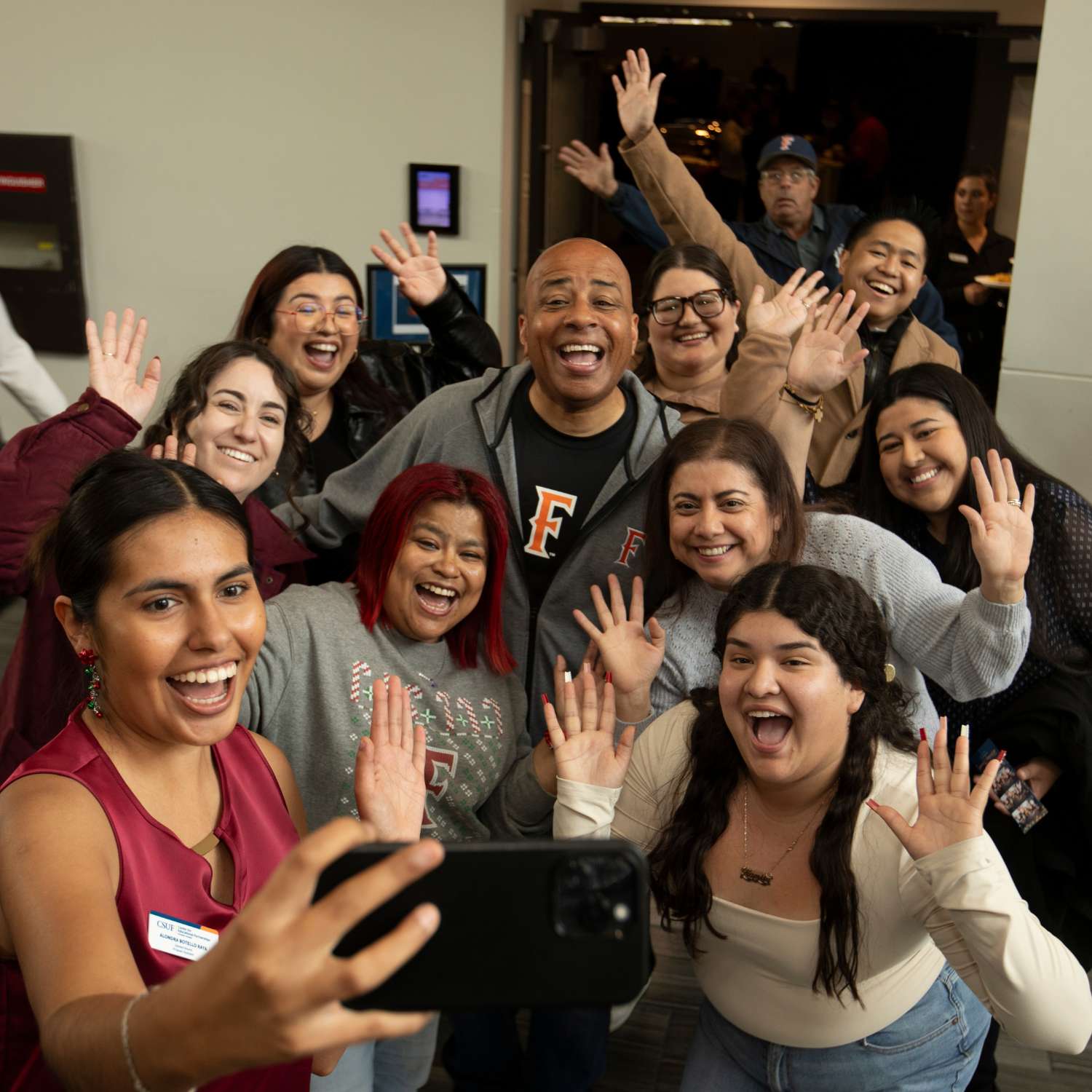 Center for Educational Partnerships team posing for a selfie with CSUF President Rochon