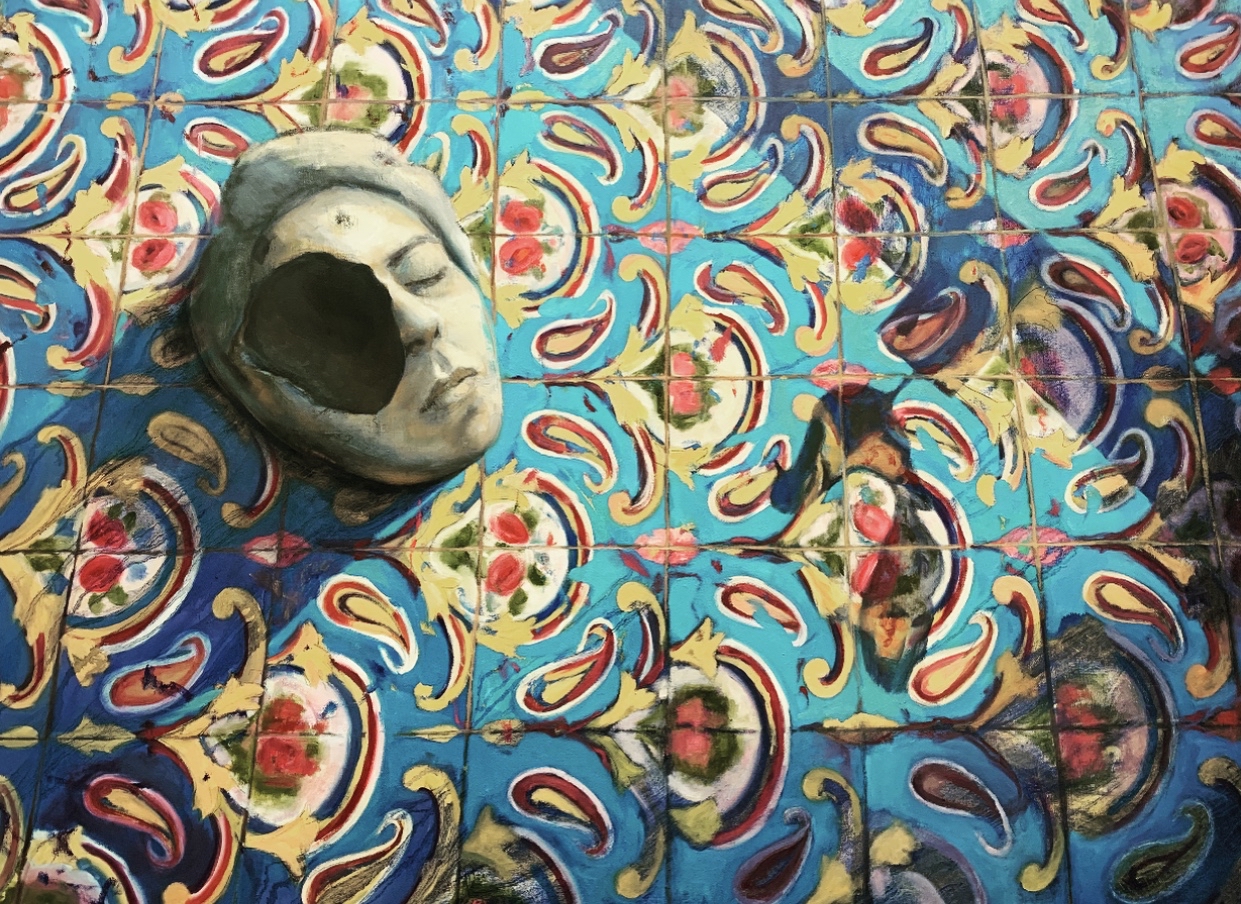 Face on background of Persian tile