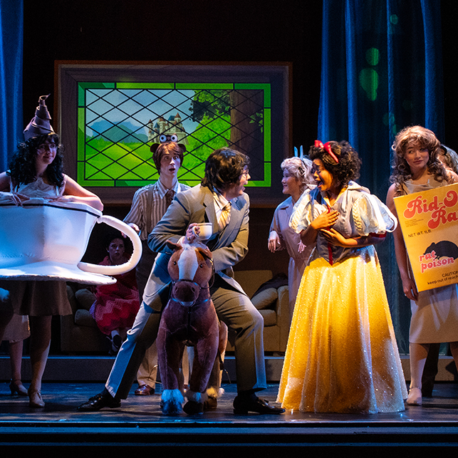 Stage actors dressed in fairy tale costumes.