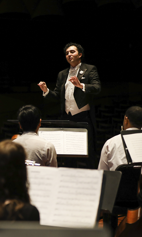 Conductor at the podium.