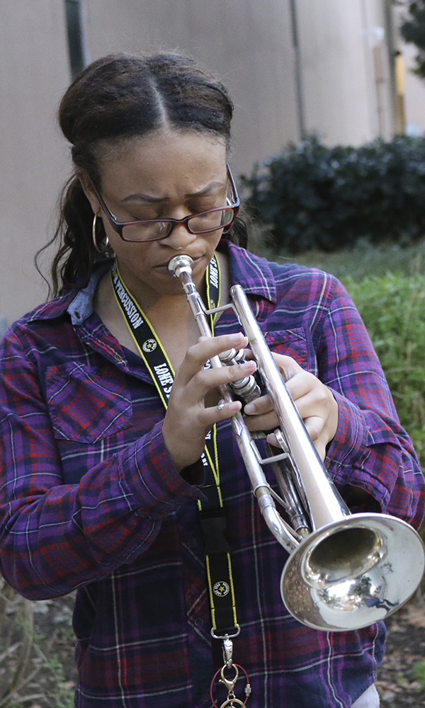 Trumepter performing outside.