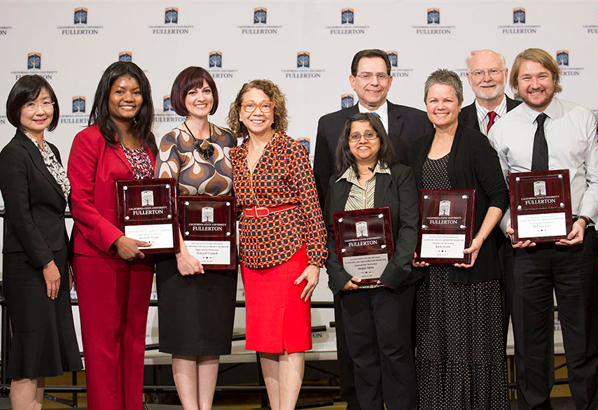 teamwork and collaboration award winners at university awards event