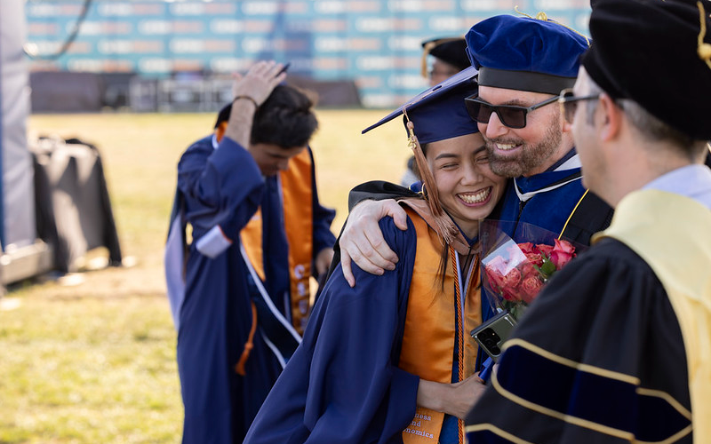 Graduate at commencement