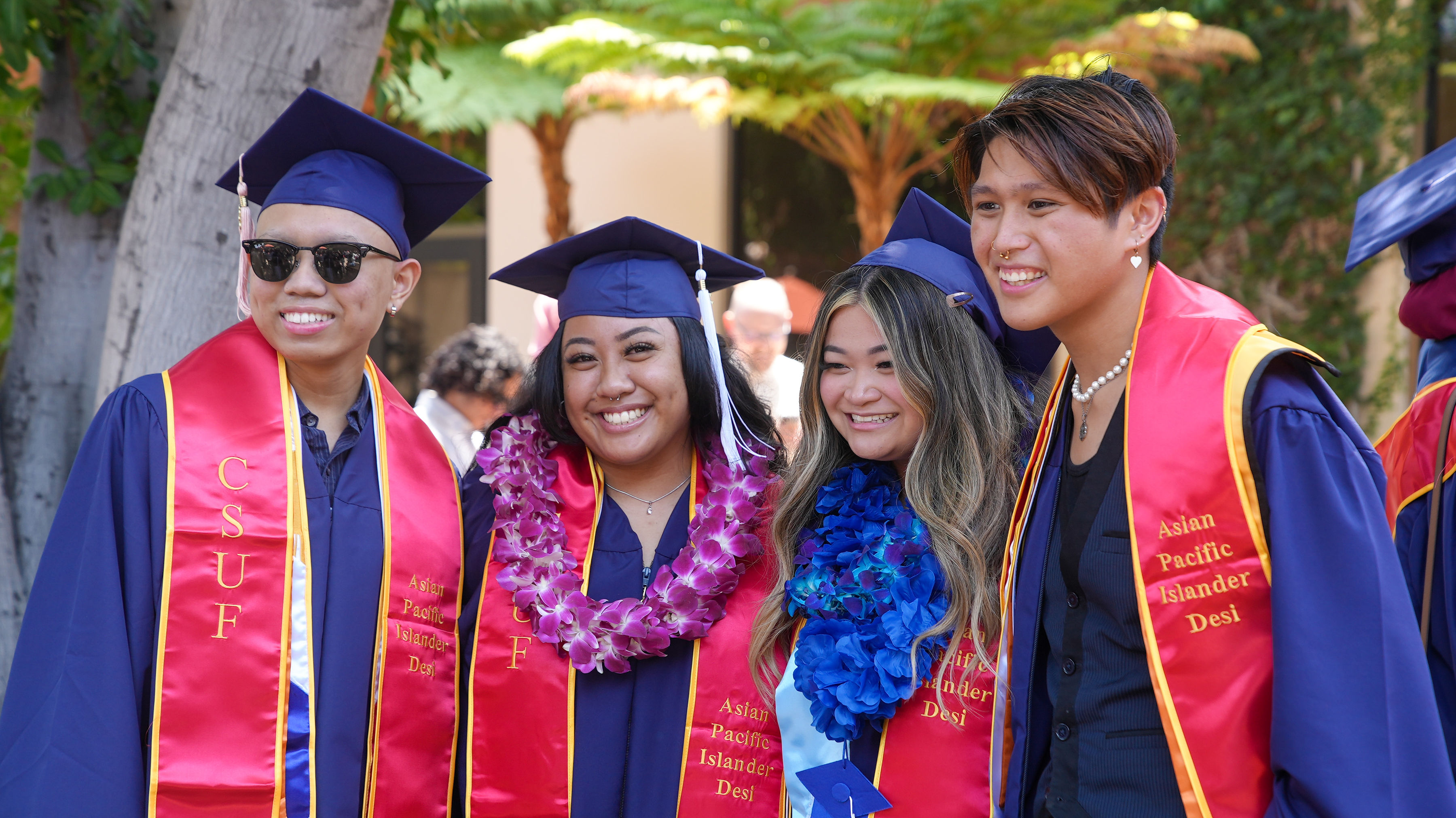 graduating students smiling