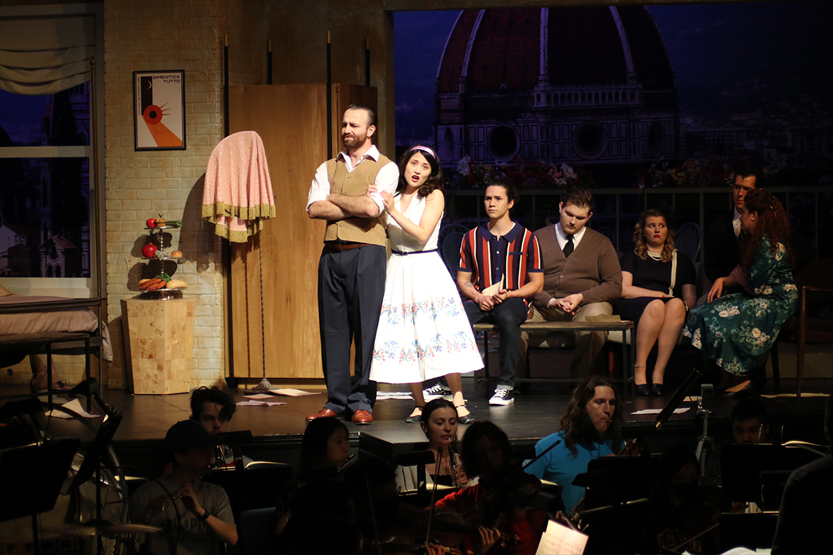 Opera performers and orchestra.