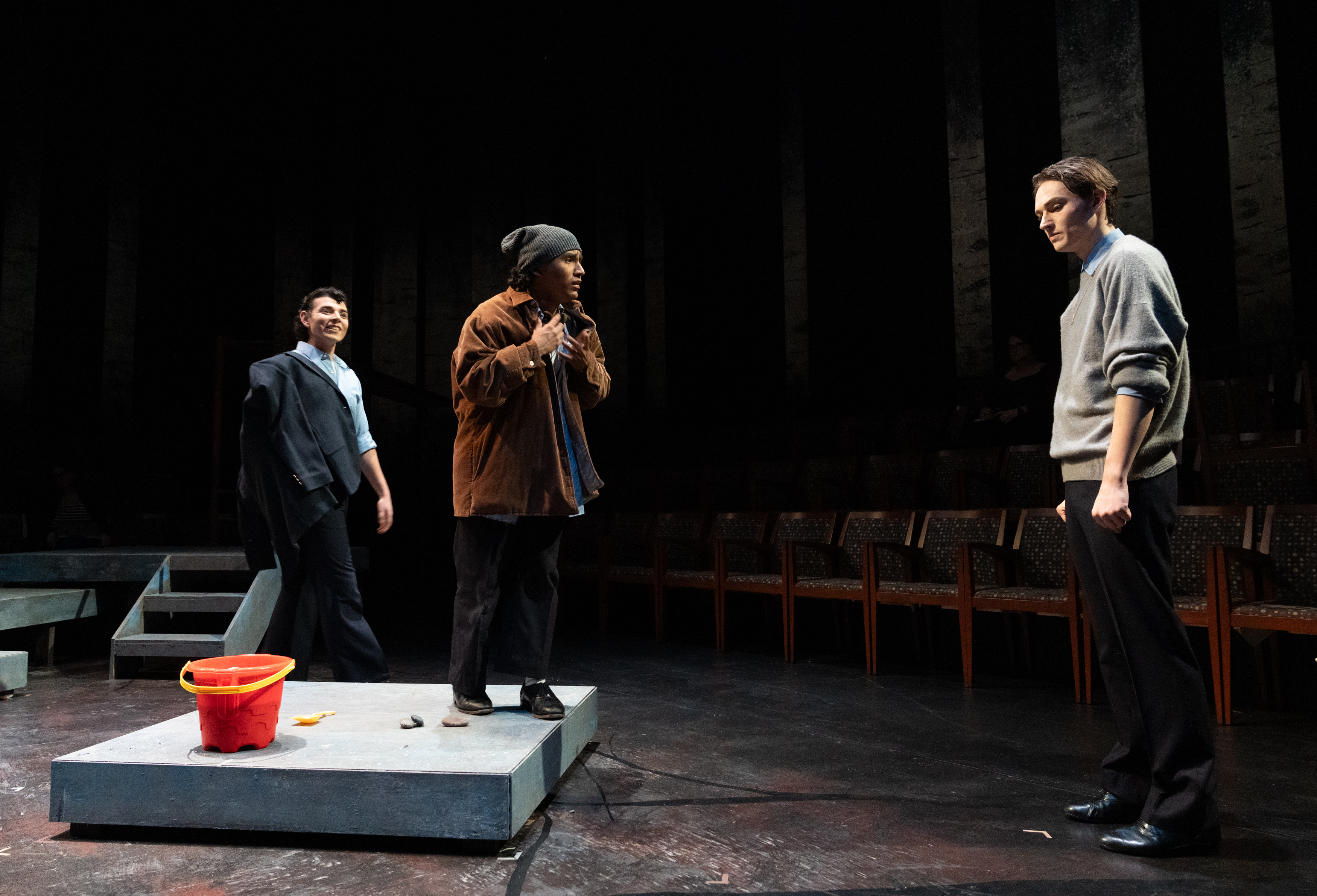 Actors on stage in the Hallberg Theatre.
