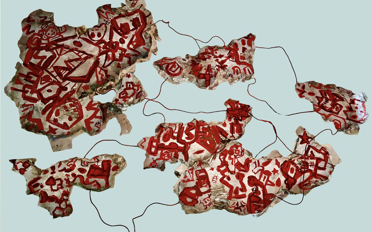 Red and white jagged shapes linked by a red string.