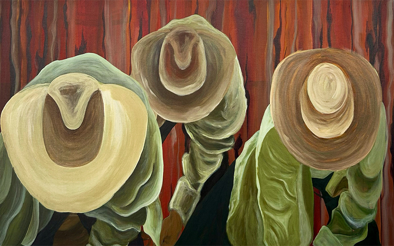 The tops of three heads wearing hats.