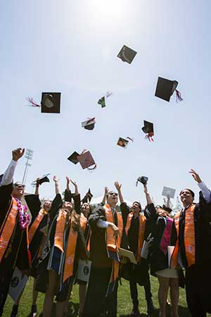 Graduates Throwing Their Caps in the Air
