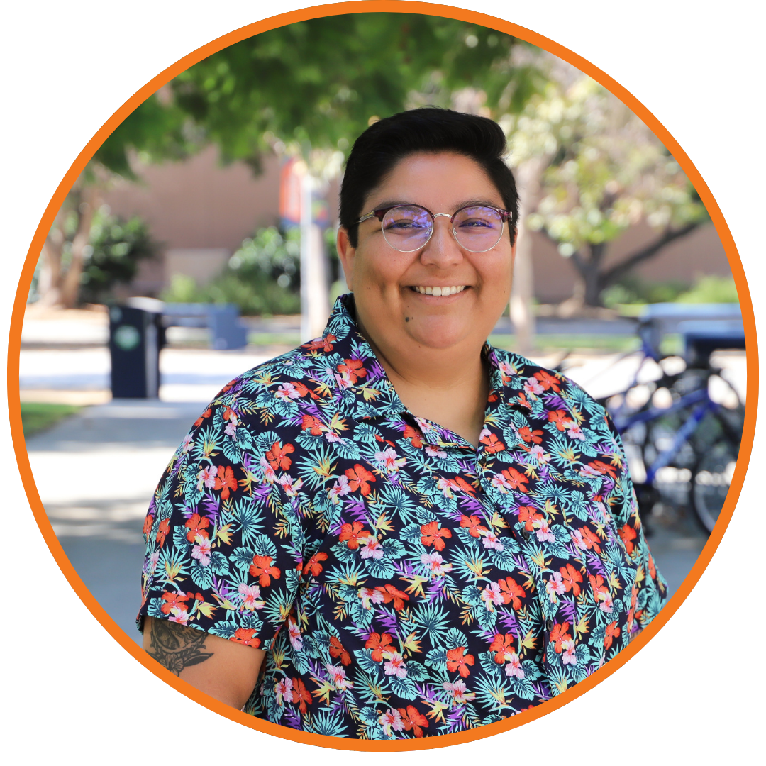 Person smiling in colorful shirt