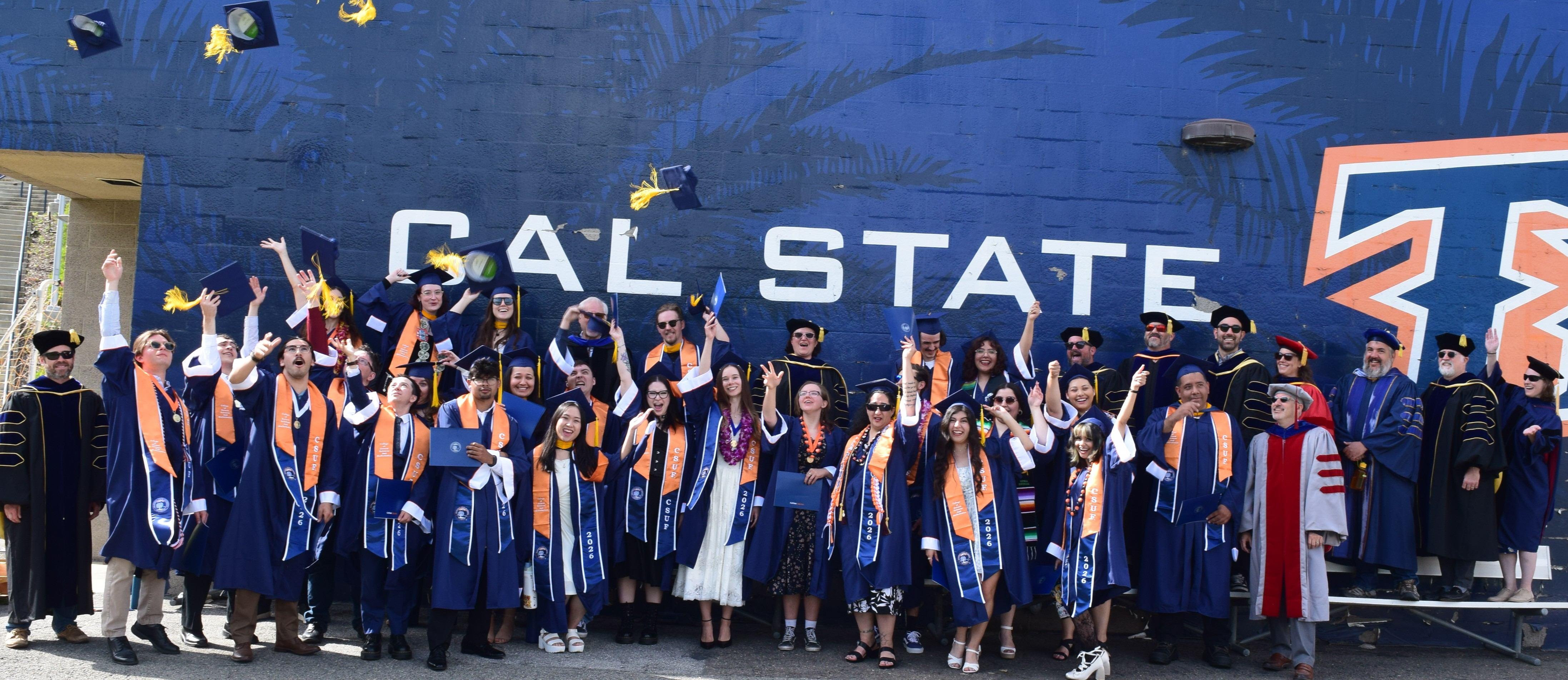 Geology Class of 2026 throwing up their graduation caps