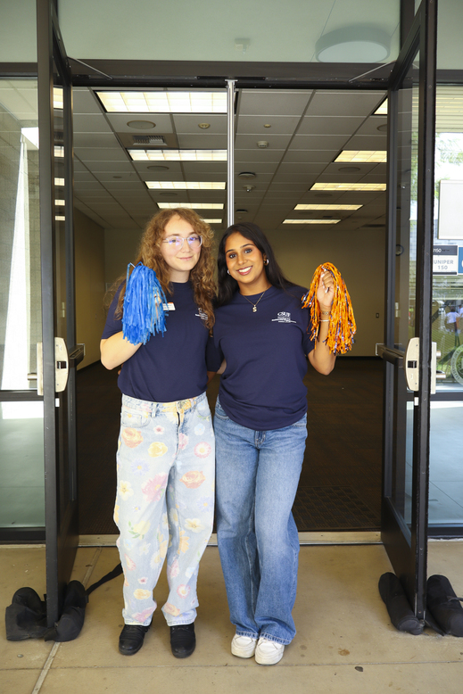 Student Employees Standing at Doorway