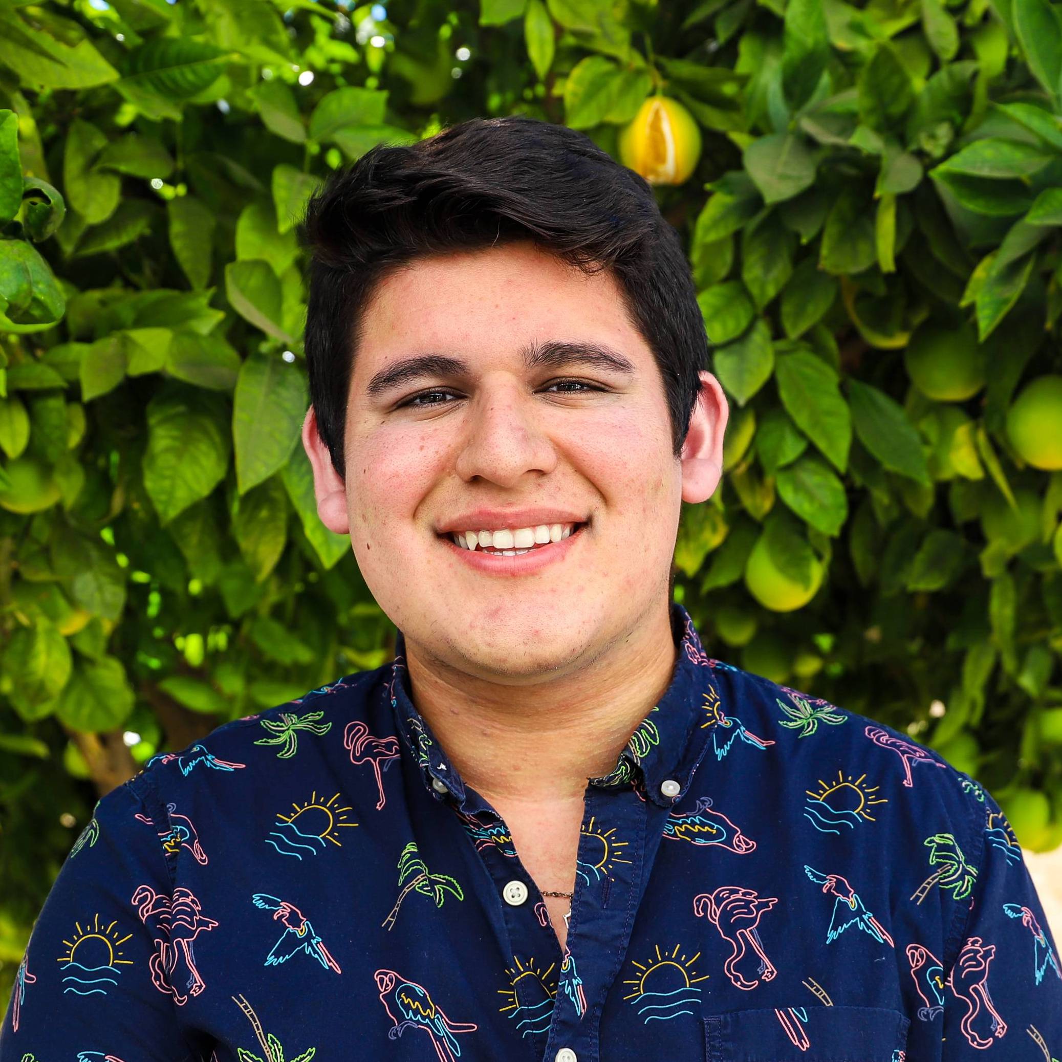 Professional headshot of Student Assistant Luis