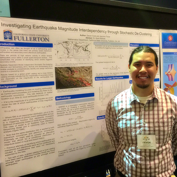 Devon Cook Devon Cook next to his research poster