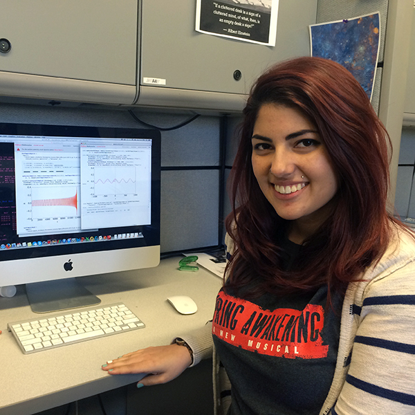 Alyssa Garcia Alyssa Garcia presenting her work on the computer