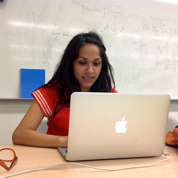 Naarai Garcia Naarai Garcia working on her Apple computer