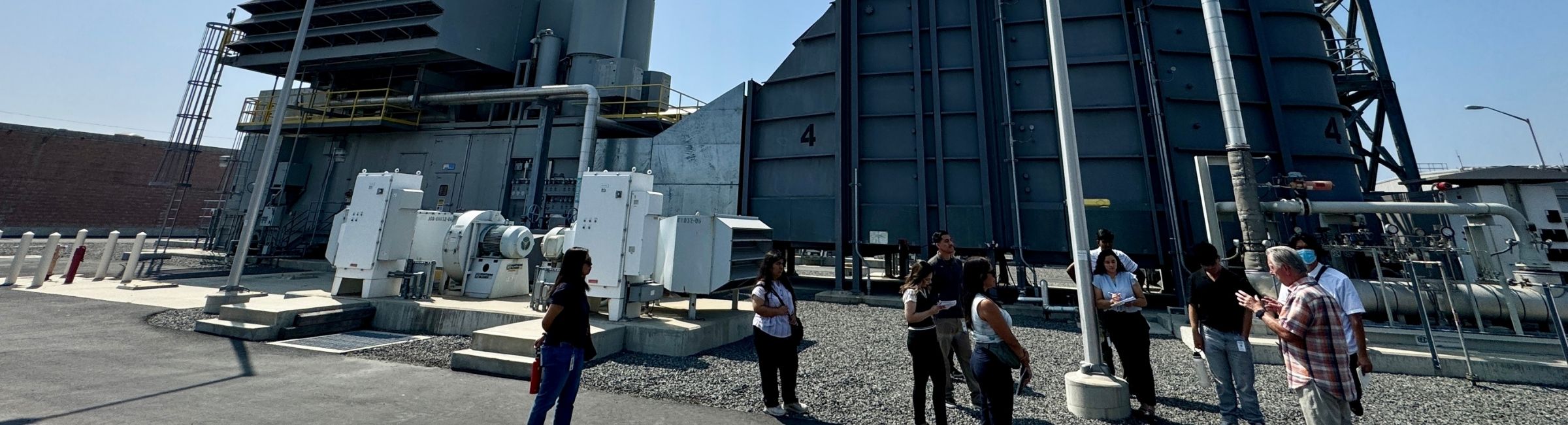 Group of interns learning about how electricity is produced. 