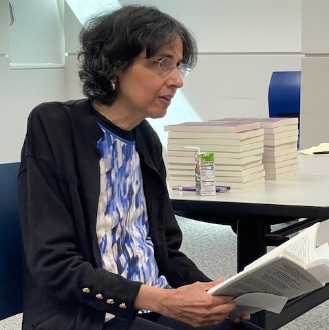 Frieda in Class reading a Book