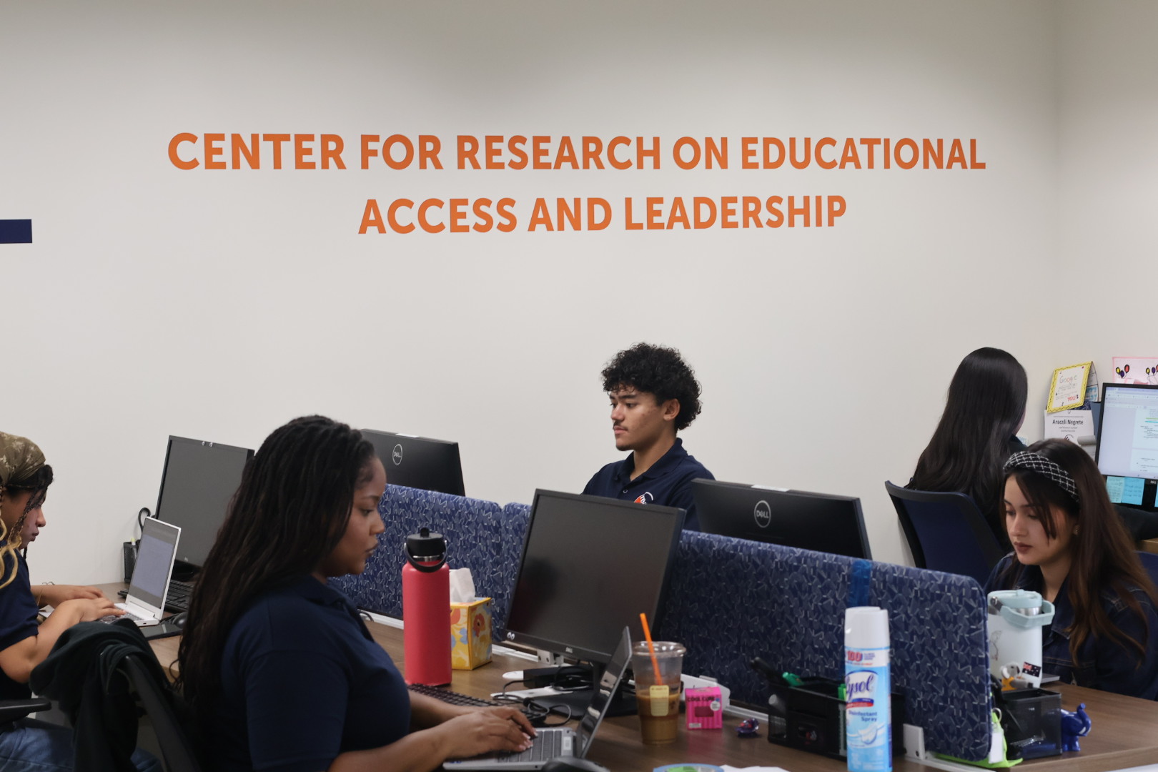 Students on computers at C-Real