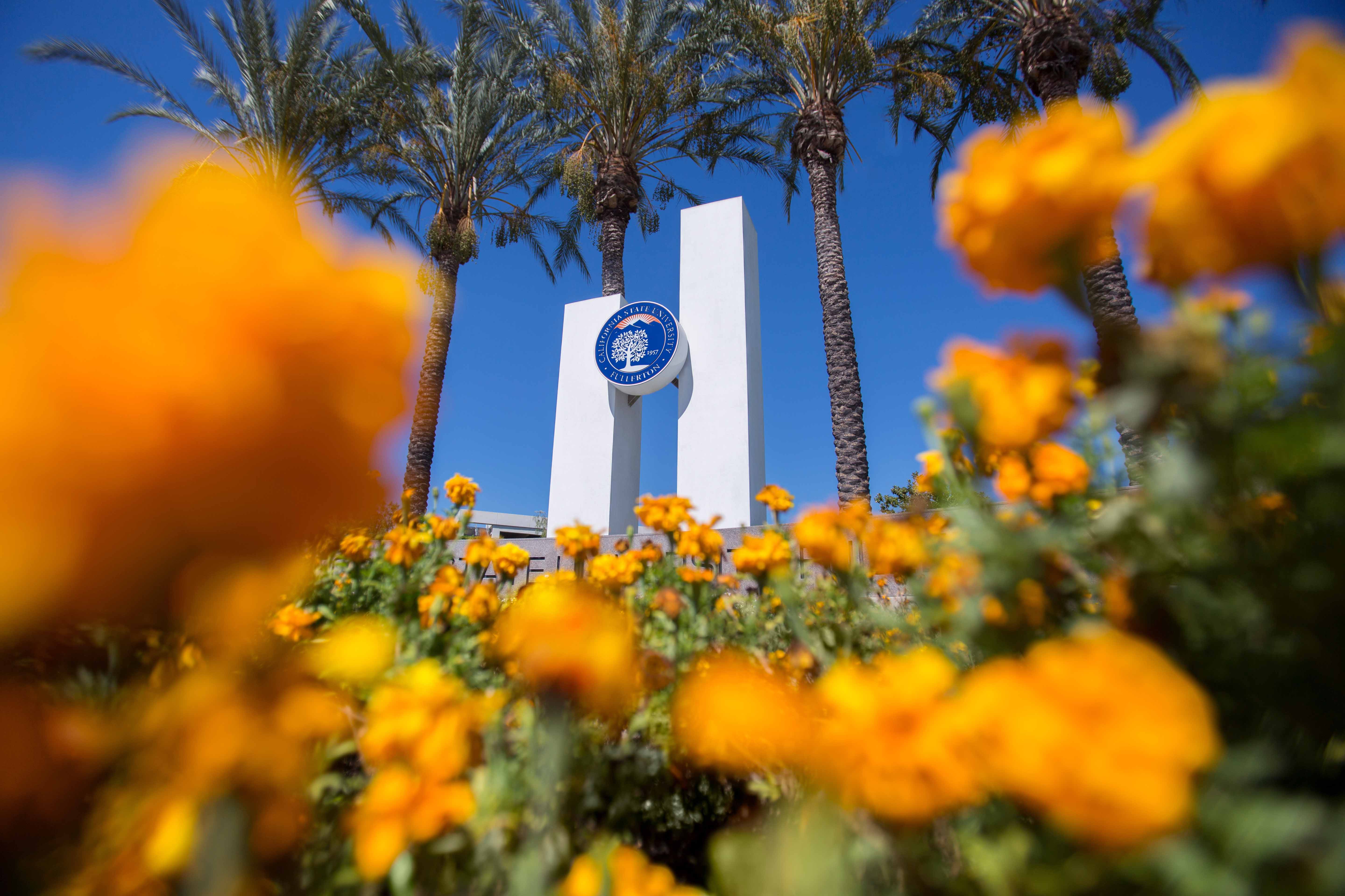 white towers with CSUF seal