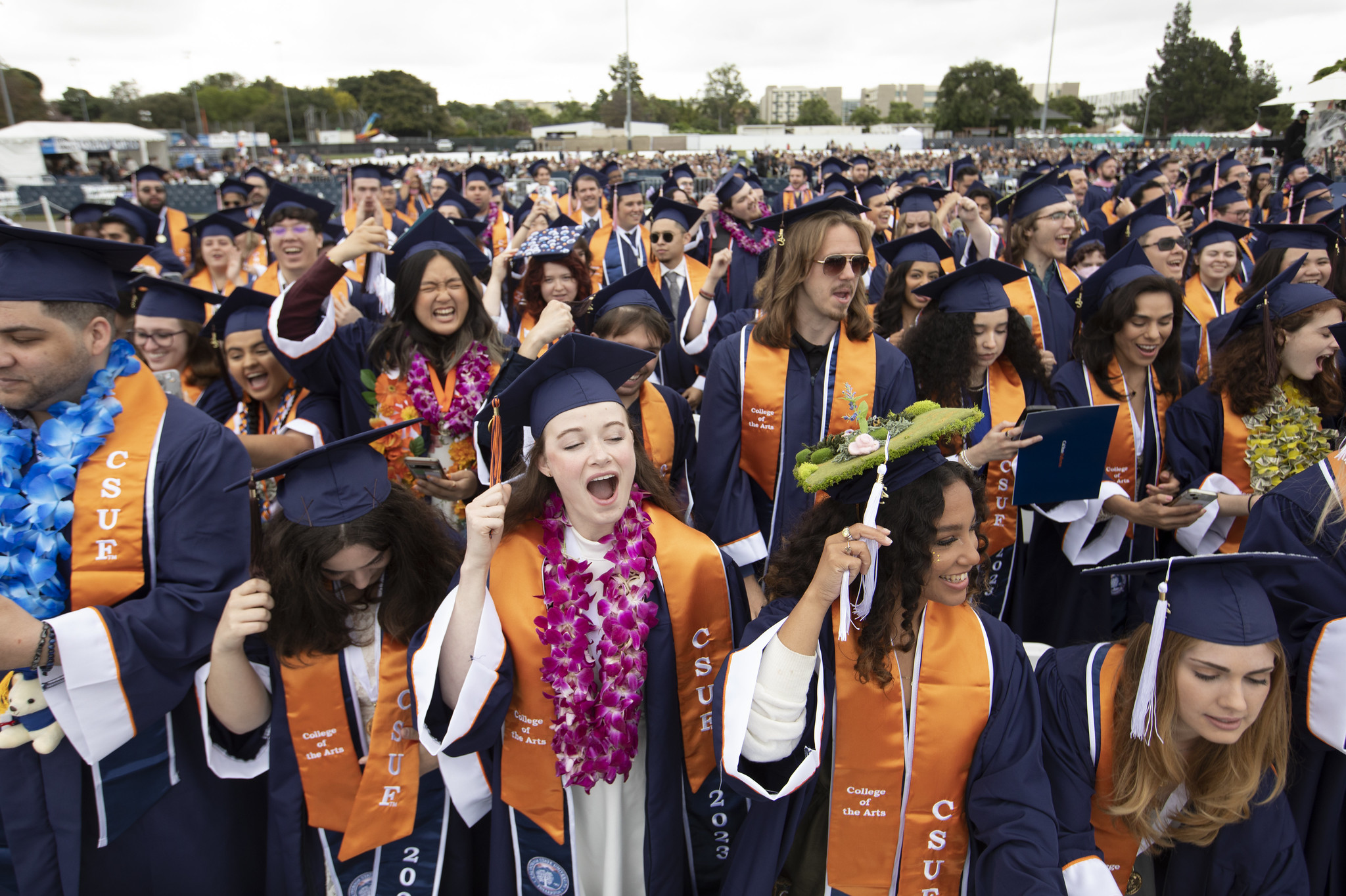 CSUF students at graduation, graduation photo