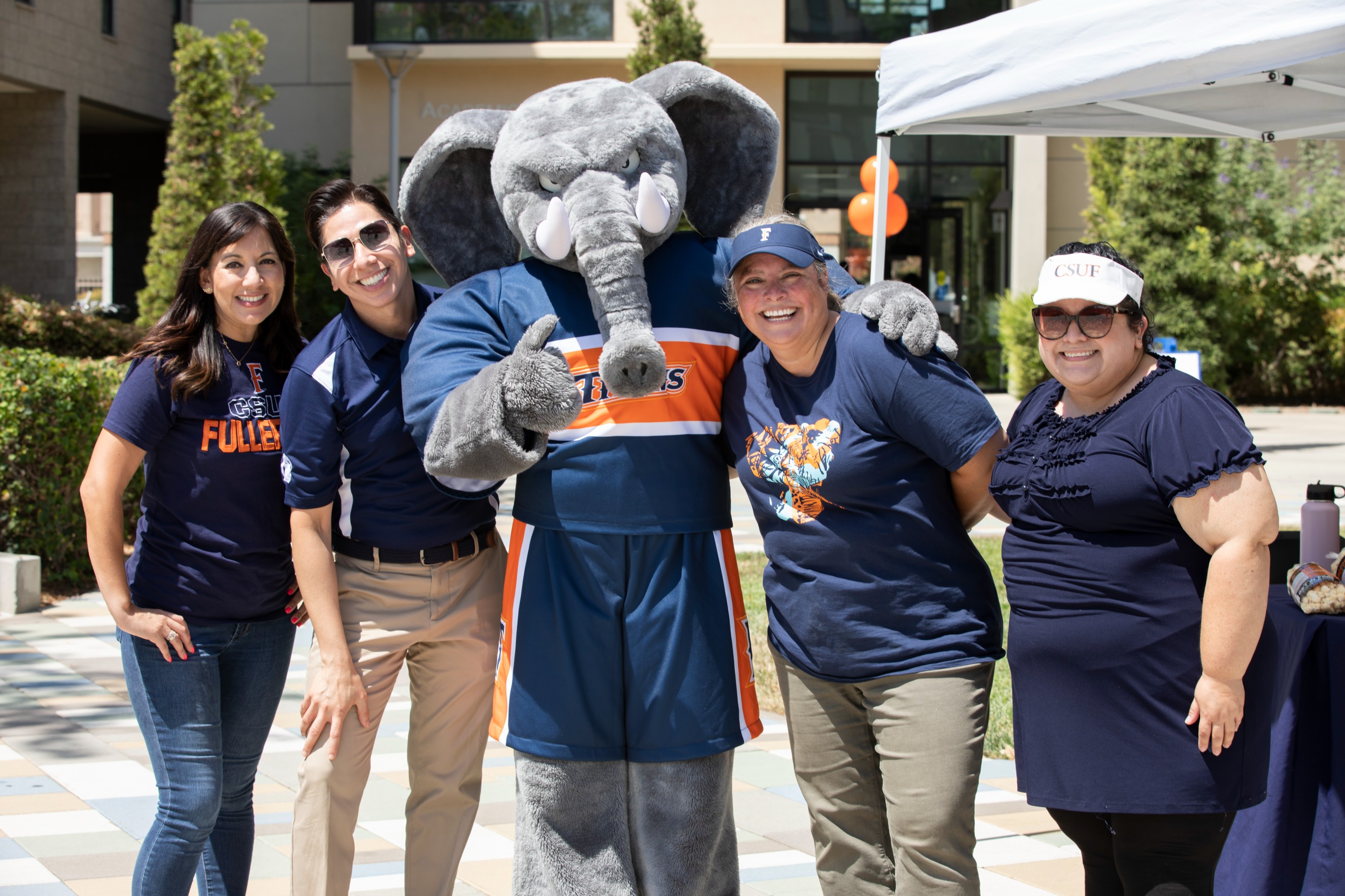 tuffy with student graduating