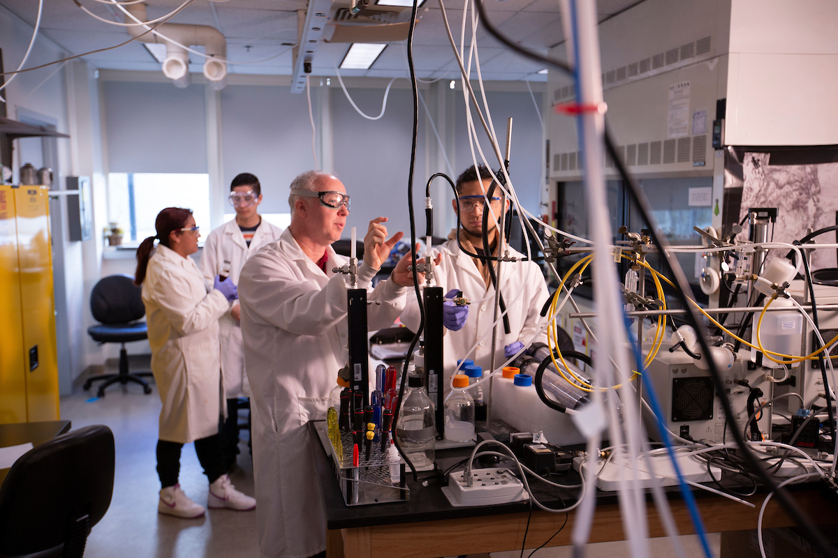 chemistry lab with instructor and students